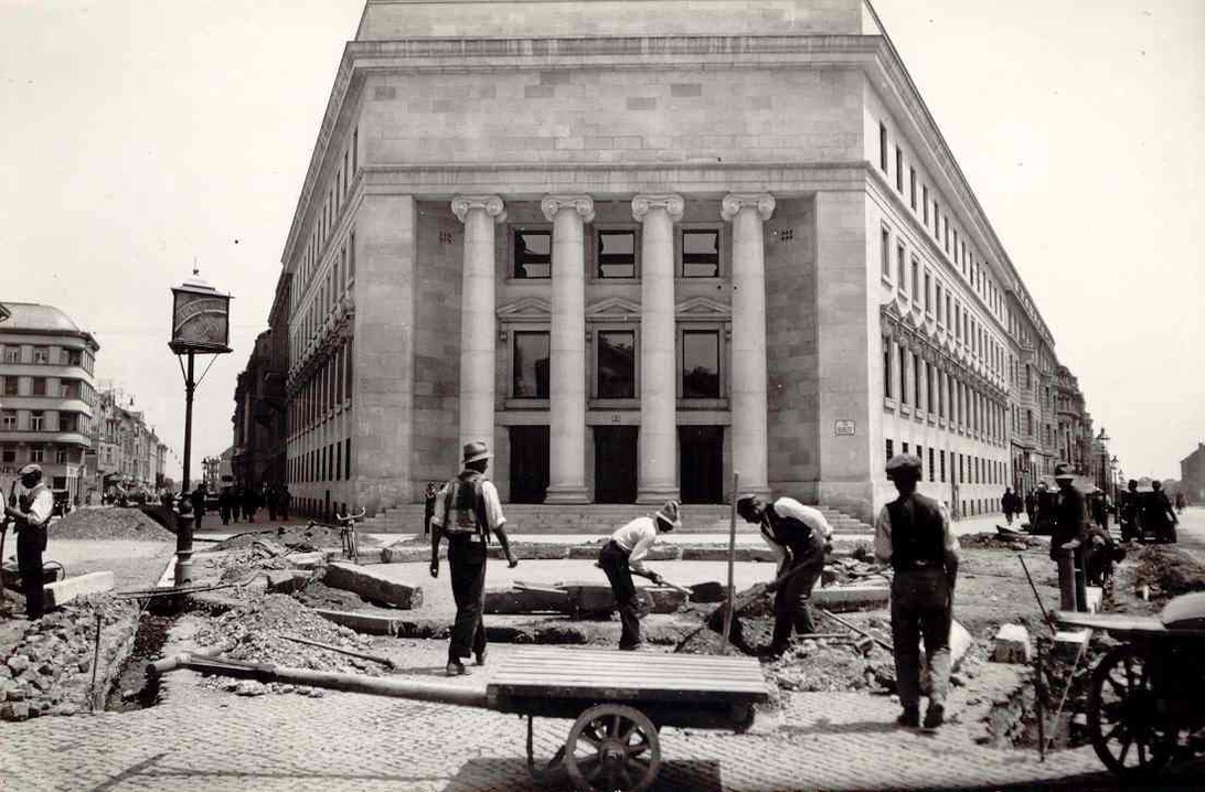 Historic photograph of a monumental building and street works in Zagreb